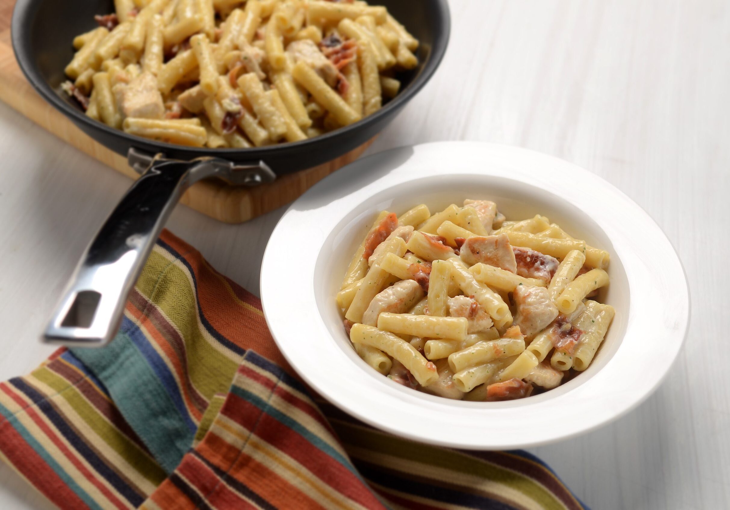 Ziti, chicken breast, and crumbled bacon in a cream sauce