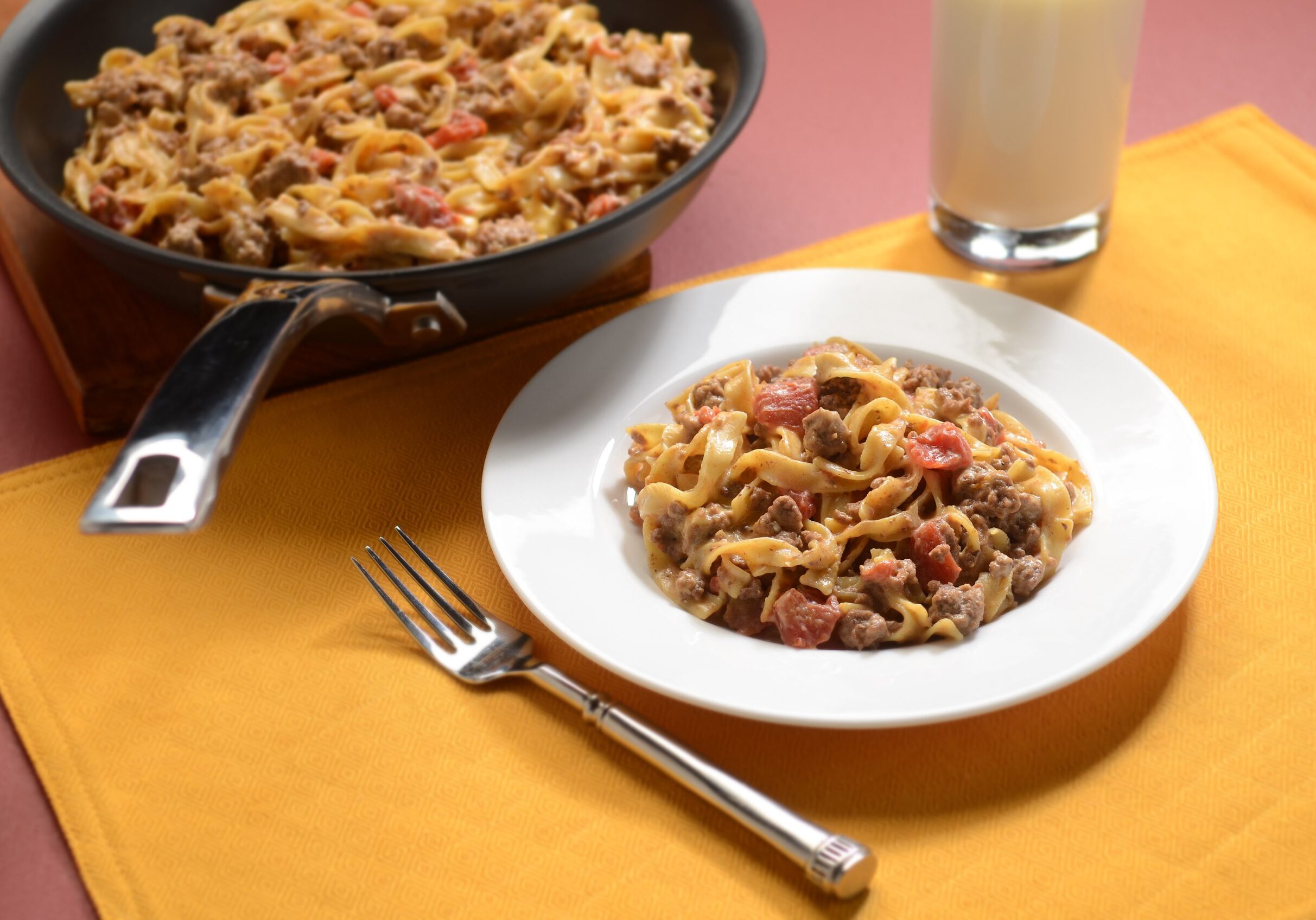 Cheeseburger-flavored dish with egg noodles, ground beef, and tomatoes, topped with cheese