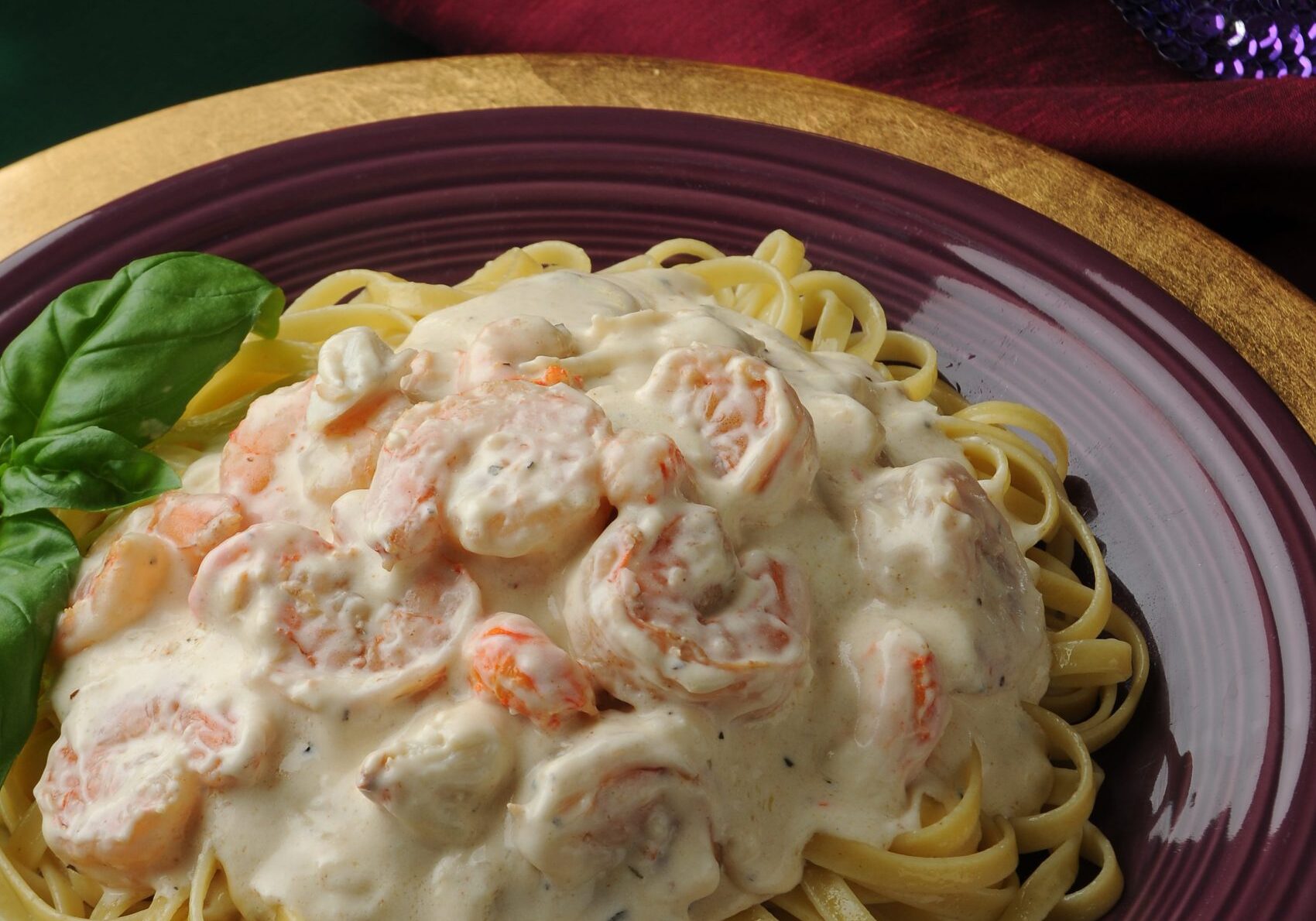 Creole seafood fettuccini with shrimp and Cajun seasoning in a cream sauce