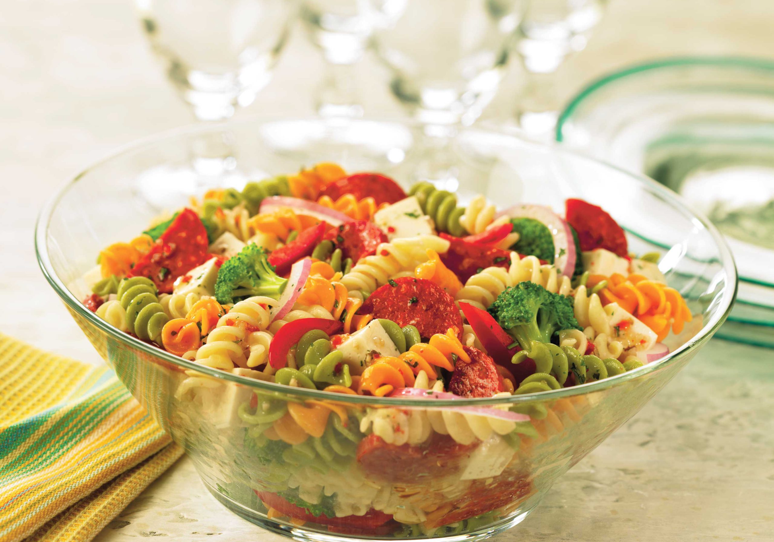 Pepperoni, mozzarella, and vegetables combine for an Italian-inspired pasta salad that’s easy and quick to pull together.